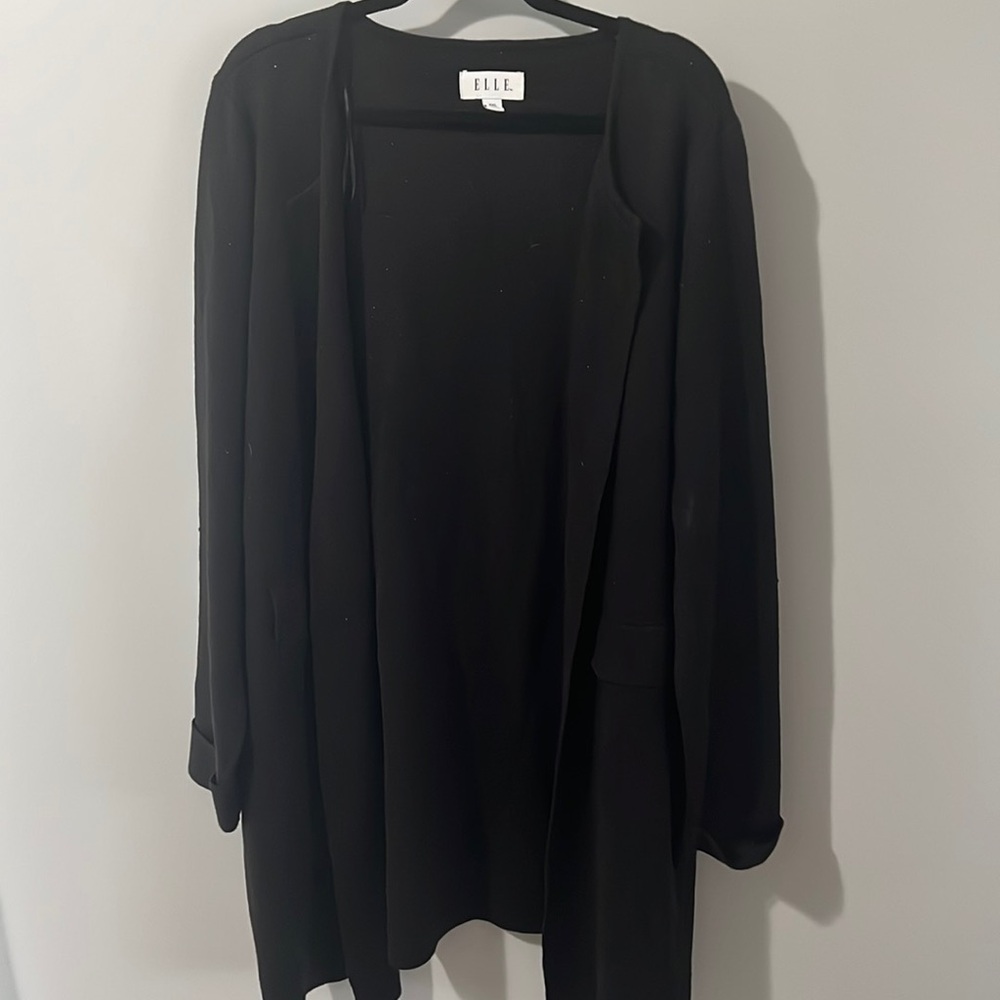 Very thick Hugh quality sweater.  Has a little bit of sparkle in the threading.